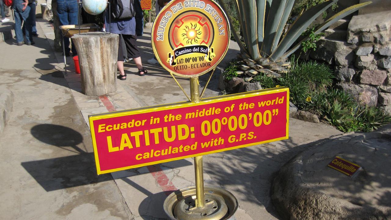08/04/2009 TRAVEL: TRAVEL -  SSS - Ecuador by Brad Crouch. Equator sign at Mitad del Mundo - the Middle of the World