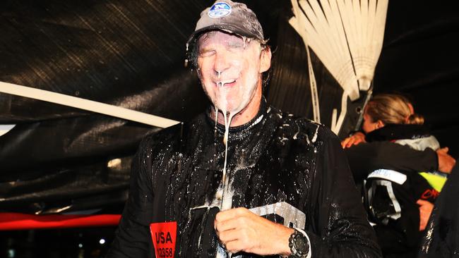 Skipper Ken Read celebrates Comanche’s line honours win in Hobart.