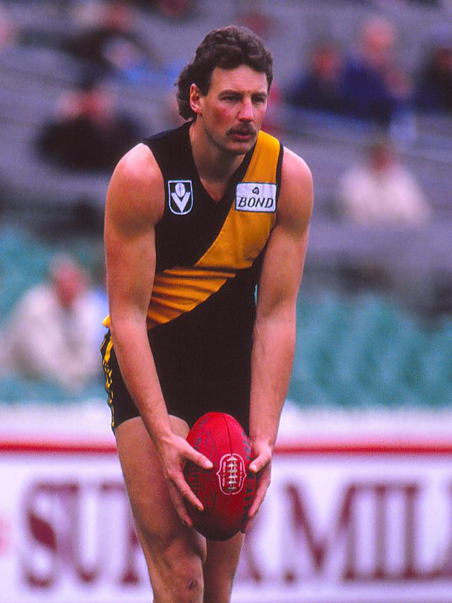 Michael Roach during his playing days. (Photo by Getty Images)