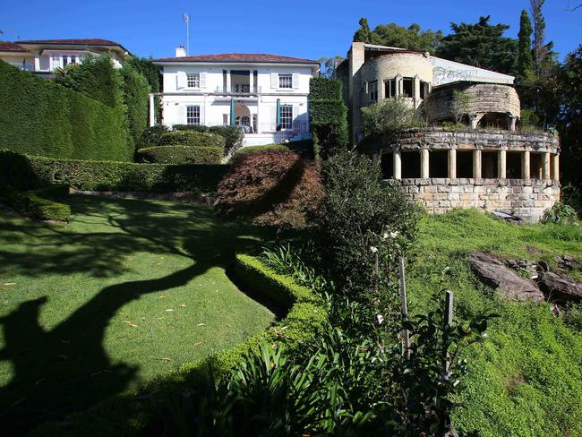 The ruins of Morella, right, and its perfectly maintained neighbours in Mosman. Picture: Phillip Rogers