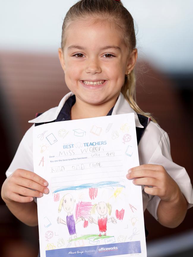 Isla Kurzydlo with her letter for Mrs Walker. Picture: Steve Pohlner