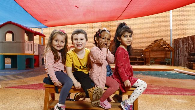 Pictured at Planet Kindy Childcare in Liverpool is Emilia Romovic, Maximus Karantonis, Aseel Siddig and Merna Said. Waitlists for childcare in Sydney are at all time highs as are the costs. Picture: Richard Dobson