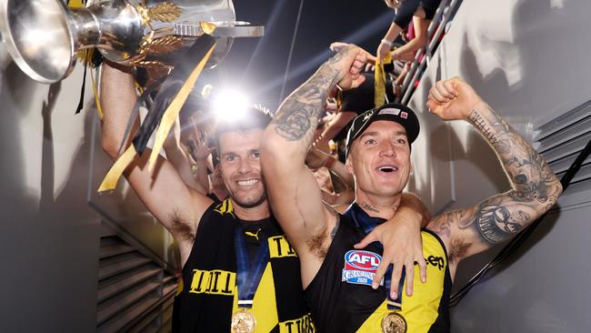 Richmond skipper Trent Cotchin and Dustin Martin enjoy a third premiership. Picture: Michael Klein