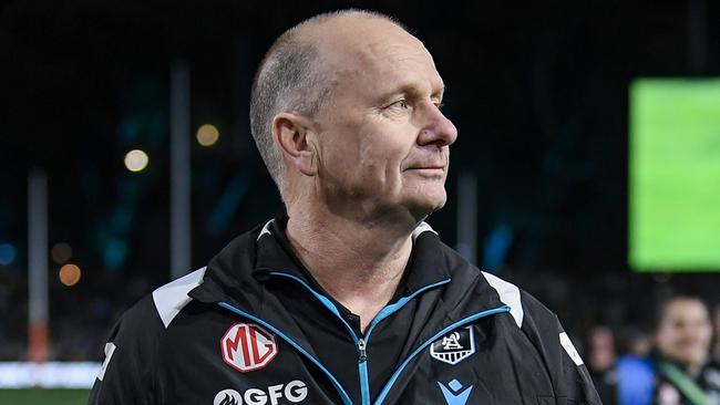 ADELAIDE, AUSTRALIA - SEPTEMBER 13: Ken Hinkley, Senior Coach of the Power  walks off the ground  after  the AFL Second Semi Final match between Port Adelaide Power and Hawthorn Hawks at Adelaide Oval, on September 13, 2024, in Adelaide, Australia. (Photo by Mark Brake/Getty Images)