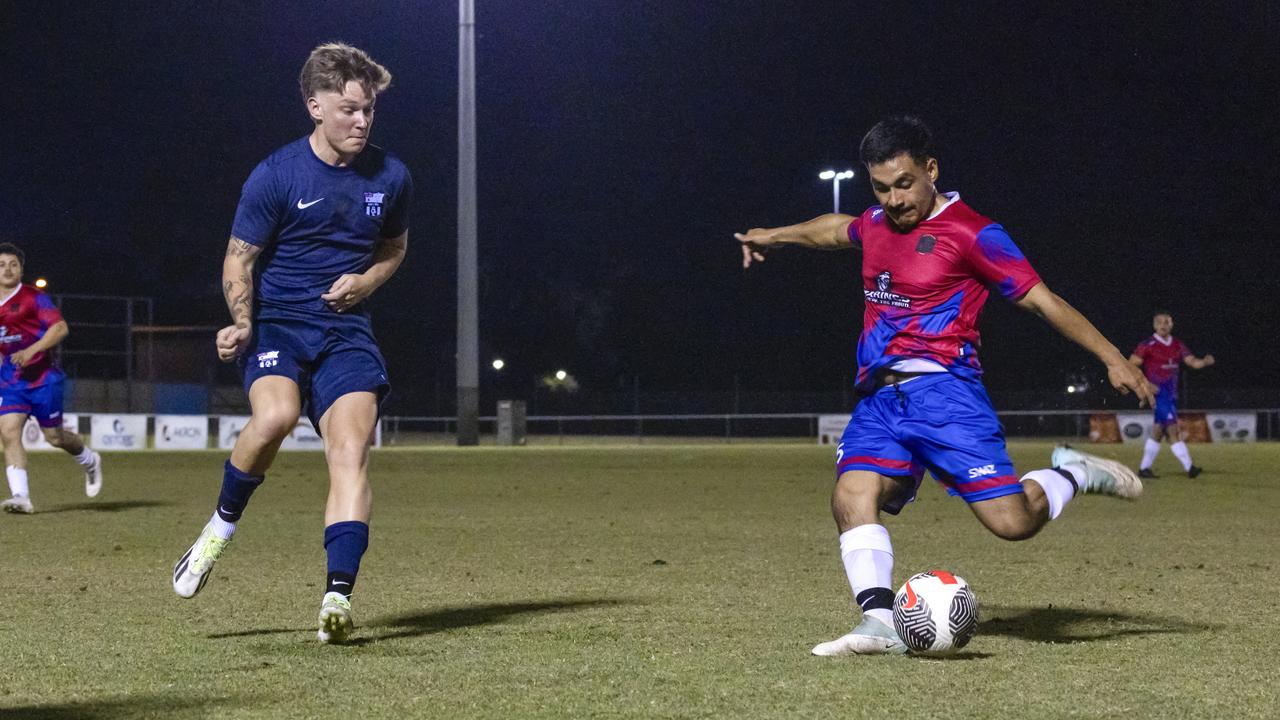 A Royal Australian Navy sailor and a United States Marine compete for the ball during a 4th of July soccer match held at Darwin Football Stadium, NT. 2024. Picture: Supplied.