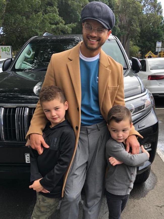 Sebastian with his sons Hudson and Archer in front of a Toyota Prado in 2020. Picture: Instagram