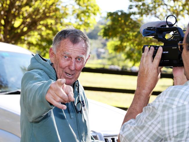 John Singleton has some fun with the media outside his Strawberry Hills Stud property yesterday. Picture: Peter Clark