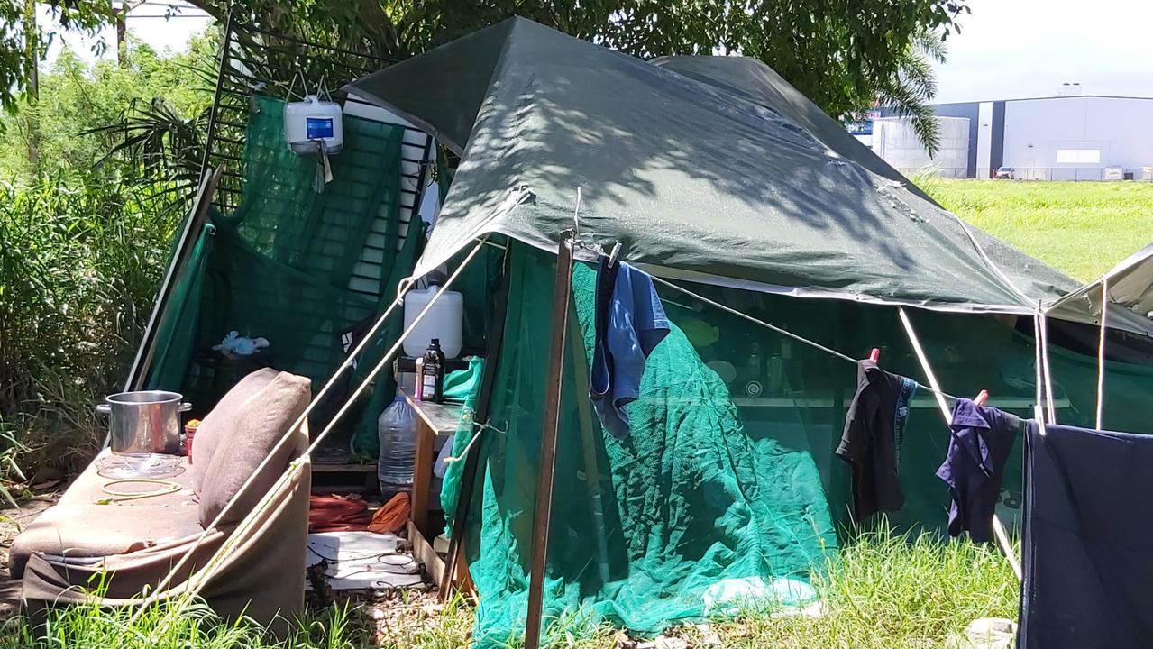 The man, his dog and his partner are living in a tent behind a petrol station. Picture: Duncan Evans