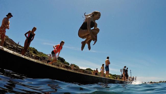 Hordes of people flock to Clovelly today to keep cool during hot conditions. Picture: Jenny Evans