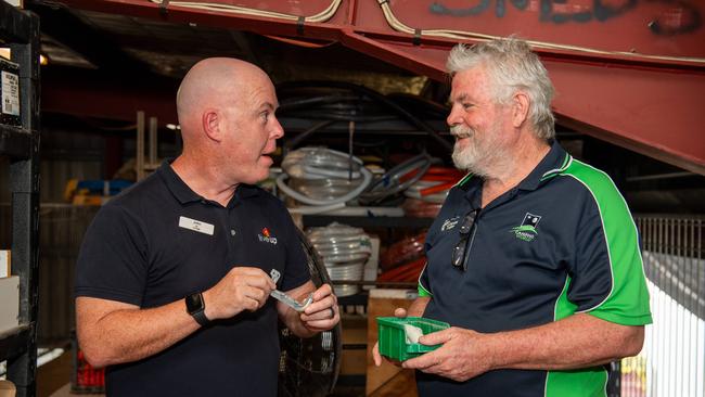 LiveUp community engagement professional John Bradshaw with Darwin Men's Shed public officer Peter Hendy at the workshop. Picture: Pema Tamang Pakhrin