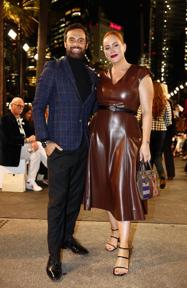 Jules Robinson and Cam Merchant at the Carla Zampatti 60th anniversary runway show, during Australian Fashion Week 2025 at the MCA Lawn in The Rocks. Picture: Jonathan Ng