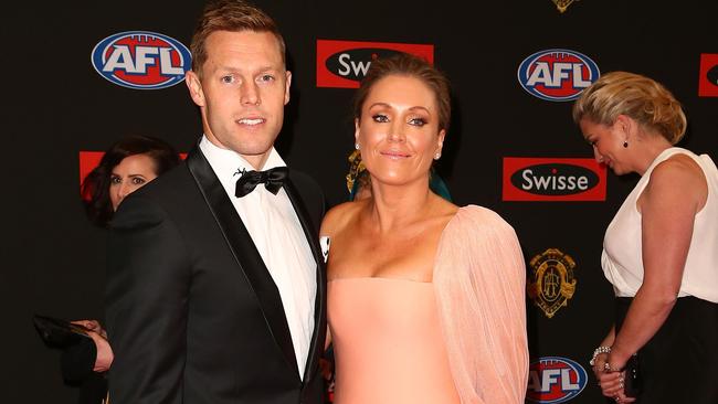 Sam Mitchell and Lyndall Mitchell arrive at the 2015 Brownlow Medal count.