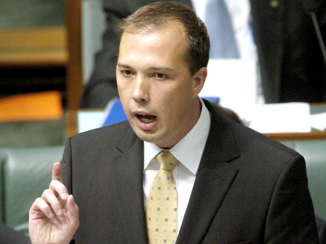 Canberra, November 17, 2004. New Minister for Workforce Participation Peter Dutton during question time in the House of Representatives chamber at Parliament House Canberra today. (AAP Image/Alan Porritt) NO ARCHIVING