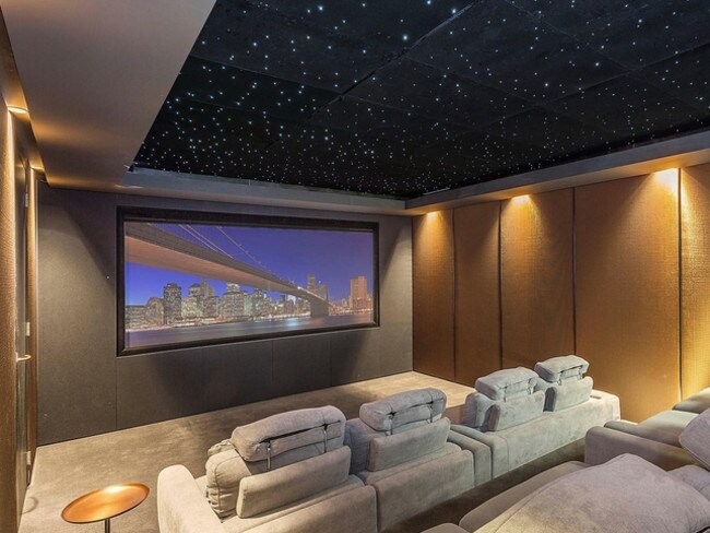 And when you’re done staring at the view, why not kick back in this state of the art media room.