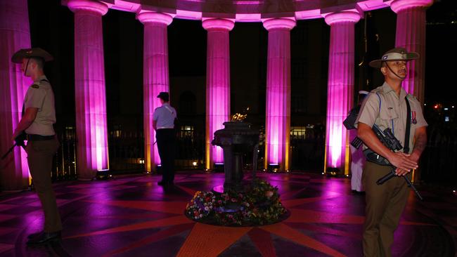 Soldiers stand around the eternal flame during the Anzac Day Dawn Service at the Shrine of Remembrance in ANZAC Square, Brisbane. Picture: NCA NewsWire/Tertius Pickard