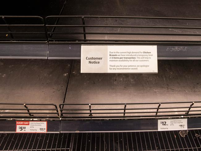 A sign notifying the public of supply chain issues in the meat section of Coles in South Melbourne. Picture: Aaron Francis