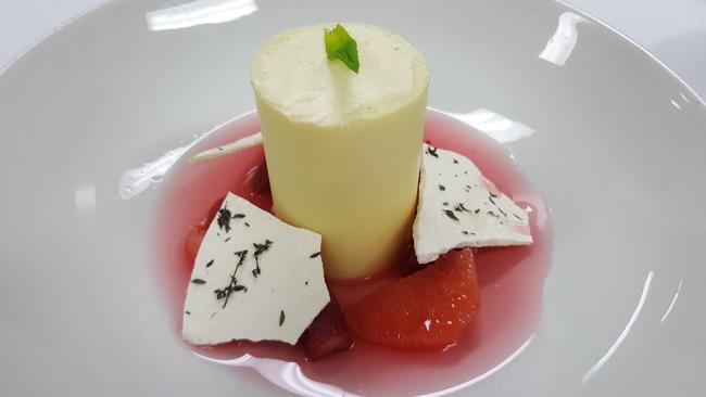 The winning dessert: white chocolate cylinder, condensed milk semifreddo, poached rhubarb and thyme meringue.