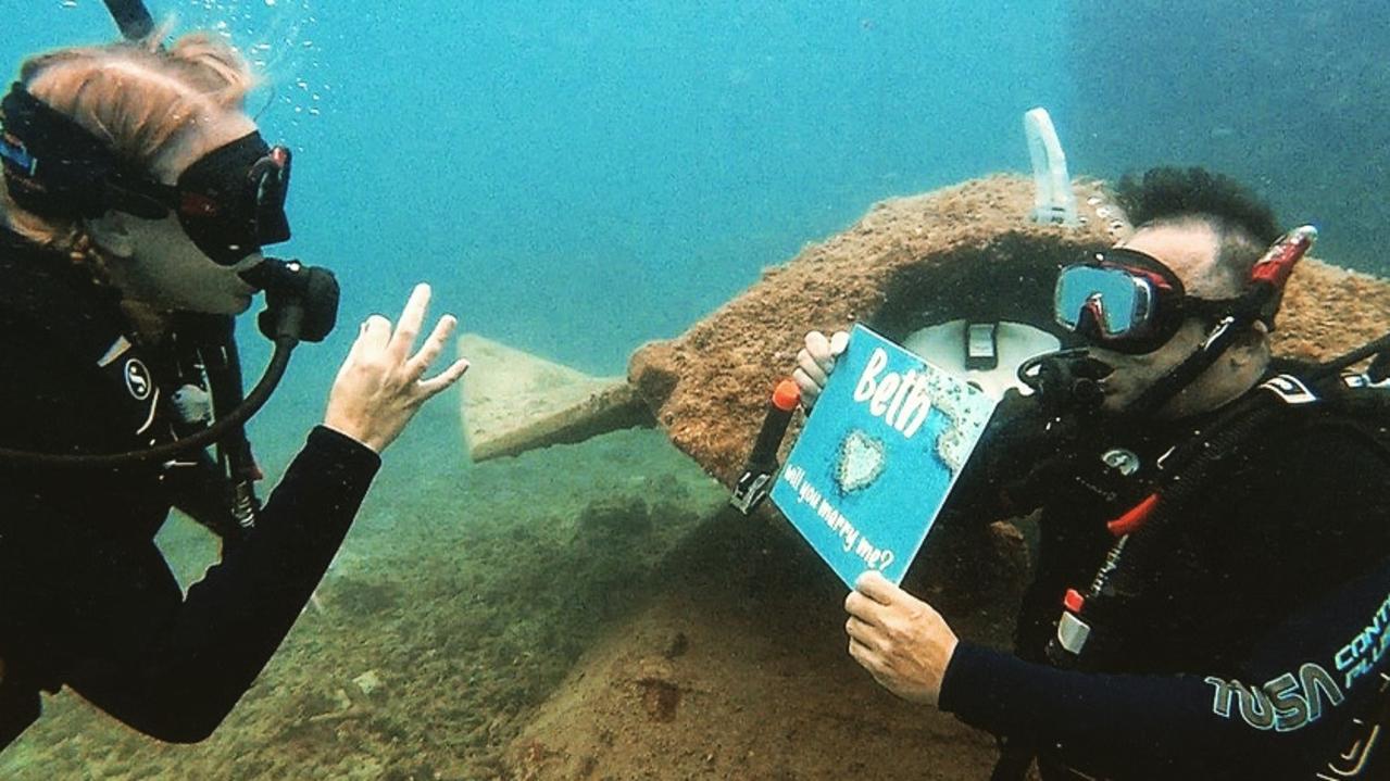 Beth Elliott and Theo Van De Pitte said the Whitsundays was 'forever a special place for the two of us' after their underwater engagement on the Great Barrier Reef in December 2021. Picture: Supplied