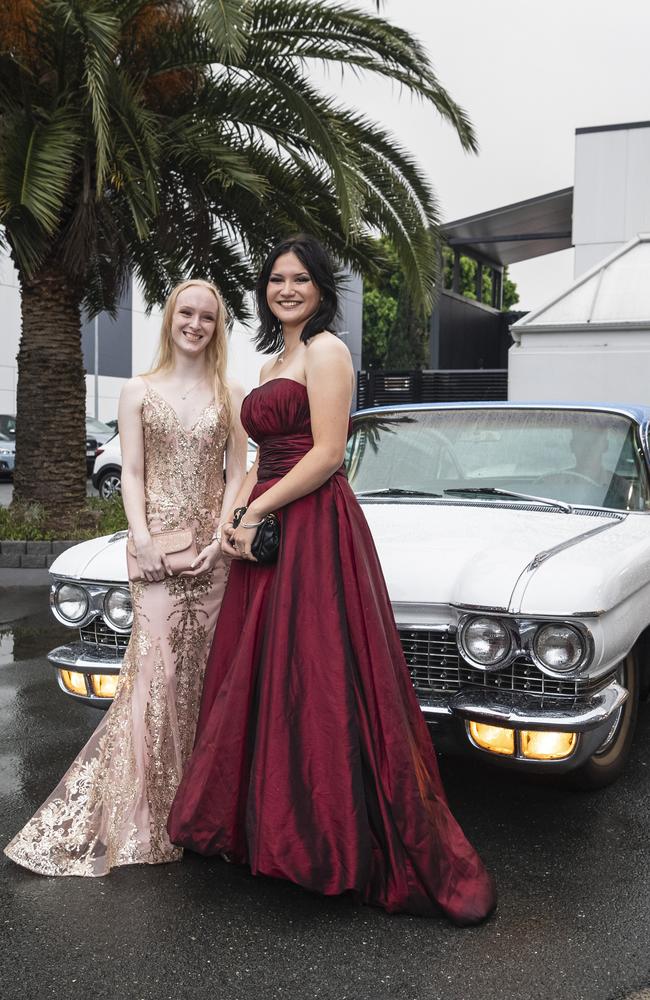 Tia Wallis (left) and Anna Rosinski arrive at Toowoomba Flexi School formal at Burke and Wills Hotel, Thursday, October 10, 2024. Picture: Kevin Farmer