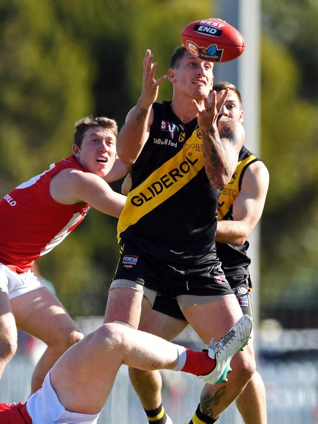 Glenelg's Jesse White takes a strong grab. Picture: Tom Huntley