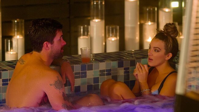 Stanaland and Hall kissed in a hot tub last year, months after his September 2022 split from Snow.