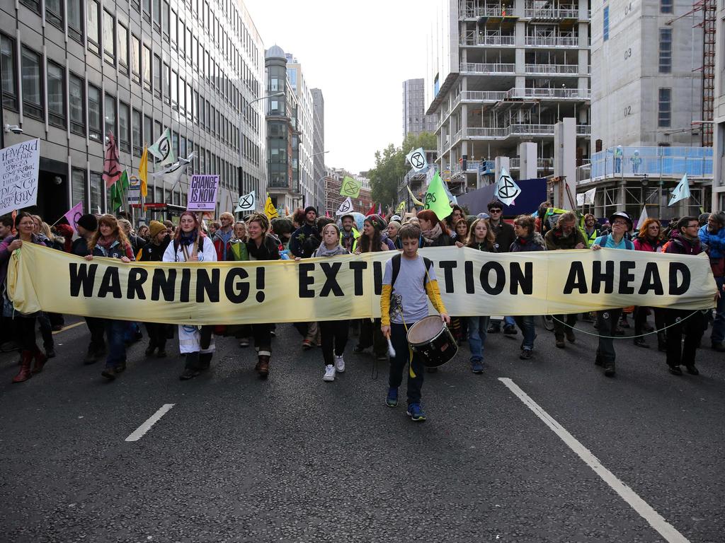 Climate activists march during the Extinction Rebellion demonstration that occurred in 60 cities around the world last year. Picture: AFP