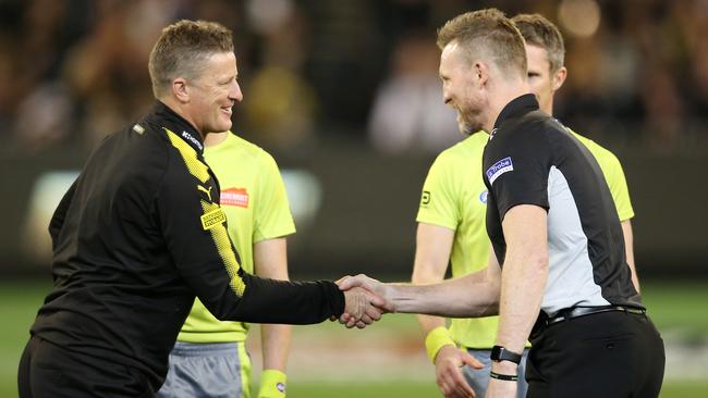 Richmond coach Damien Hardwick and Collingwood coach Nathan Buckley shake hands pre-game. Picture: Michael Klein