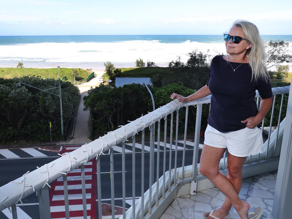 Jen Masters keeping an eye on the weather from her Main Beach unit.. Picture Glenn Hampson