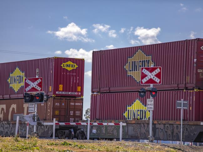 A double-stack train on the Inland Rail line, one of Australia's largest infrastructure projects.