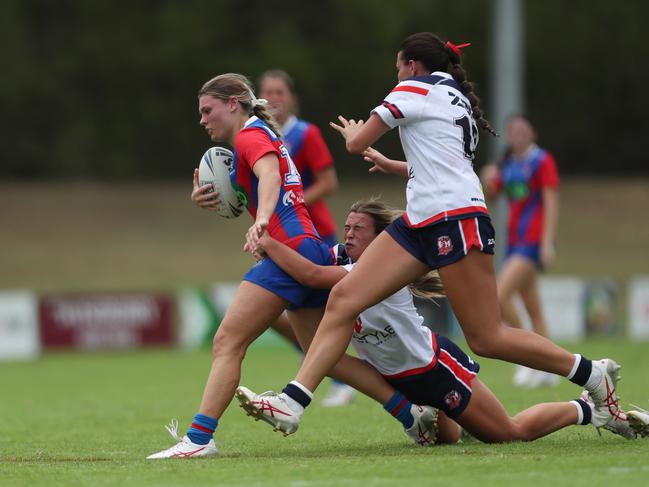 The Newcastle Knights on the charge. Picture: Sue Graham