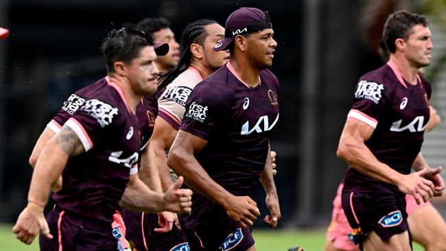 Selwyn Cobbo and his teammates take part in a sprinting session at Gilbert Park in Brisbane.