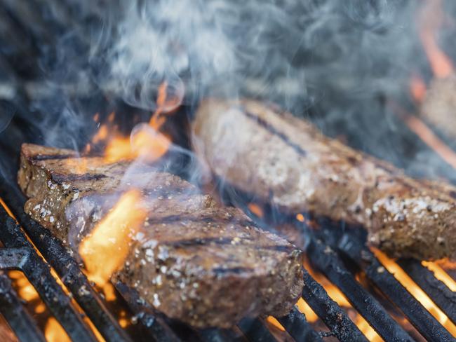 Leading chef Craig Will says is is OK to turn steaks regularly over the barbie. Picture: iStock