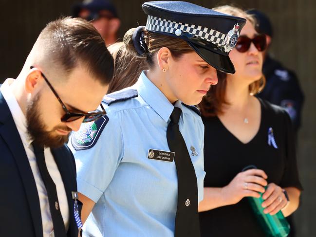 Mourners at the memorial service with full police honours for constables Rachel McCrow and Matthew Arnold at Brisbane Entertainment Centre. Picture: David Clark