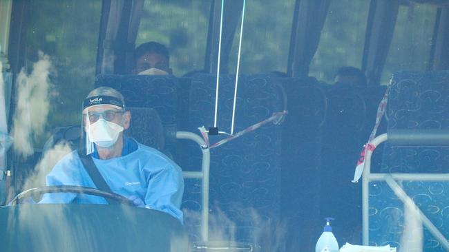 Passengers from a repatriation flight from New Delhi arrive to 14 days quarantine at Howard Springs outside Darwin. Picture Glenn Campbell