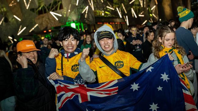 Fans at Federation Square watch the Matildas FIFA World Cup Semi Final Game, on August 16, 2023 in Melbourne, Australia. Picture: Darrian Traynor