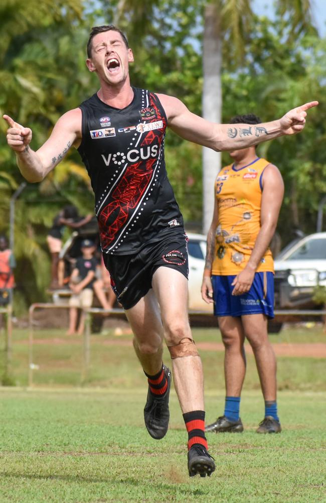 Tiwi Bombers' Sam Darley celebrates his side's win at Wurrumiyanga Oval in Round 9 of the 2023-24 NTFL season. Picture: Tymunna Clements / AFLNT Media