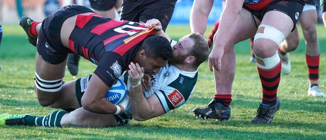 Boyd Killingworth pulls off a big tackle against Norths on Saturday. Picture: Rising Sun Photography.