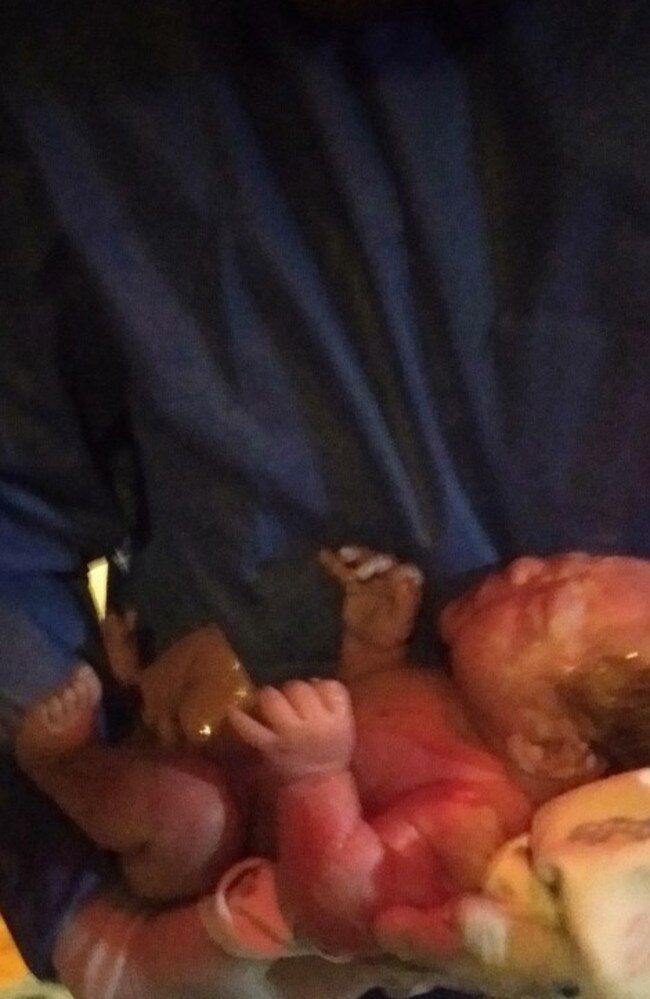 ‘Water baby’ Phoenix Jones takes his first breath after being born on a Moreton Bay water ambulance at Redland Bay ferry terminal. Picture: Contributed