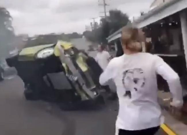 Onlookers were seen sprinting to the crash to try and help passengers involved. Picture: 7NEWS