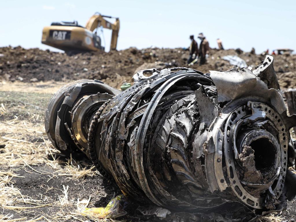 A photo shows debris of the crashed aeroplane of Ethiopia Airlines. Airlines in Ethiopia, China and Indonesia grounded Boeing 737 MAX 8 jets on Monday. Picture: AFP