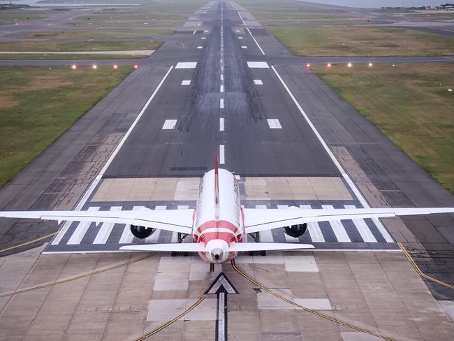 SYDNEY, AUSTRALIA - NOVEMBER 16: A Boeing 787 Dreamliner aircraft, Qantas flight QF100 prepares to take off from Kingsford Smith International airport as part of Qantas 100th Birthday celebrations on November 16, 2020 in Sydney, Australia. Australia's national airline Qantas is celebrating 100 years. (Photo by David Gray#JM/Getty Images for Destination New South Wales/Qantas)