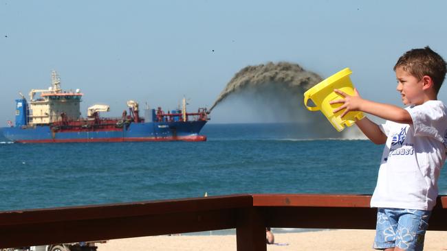 Zane Kalic playing with the barge at Mermaid Beach. Picture Mike Batterham