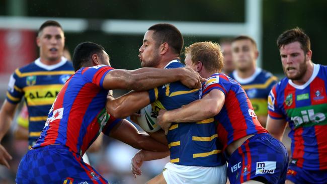 NEWCASTLE, AUSTRALIA — FEBRUARY 24: Jarryd Hayne of the Eels is tackled during the NRL Trial Match between the Newcastle Knights and the Parramatta Eels at Maitland No 1 Showground on February 24, 2018 in Newcastle, Australia. (Photo by Tony Feder/Getty Images)