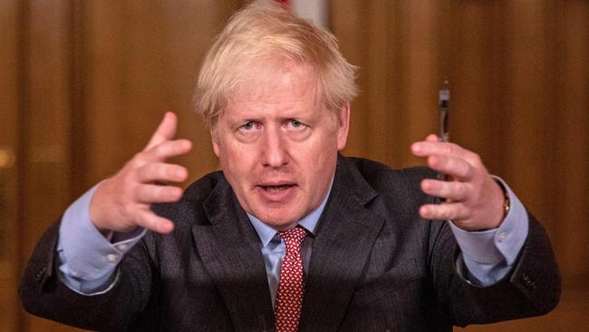 Britain's Prime Minister Boris Johnson gestures at a remote press conference to update the nation on the Covid-19 pandemic, inside 10 Downing Street in London. Picture: Pool/AFP