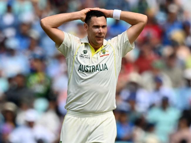 Australia's Scott Boland reacts after a delivery during play on day 5 of the ICC World Test Championship cricket final match between Australia and India at The Oval, in London, on June 11, 2023. (Photo by Glyn KIRK / AFP) / RESTRICTED TO EDITORIAL USE. NO ASSOCIATION WITH DIRECT COMPETITOR OF SPONSOR, PARTNER, OR SUPPLIER OF THE ECB