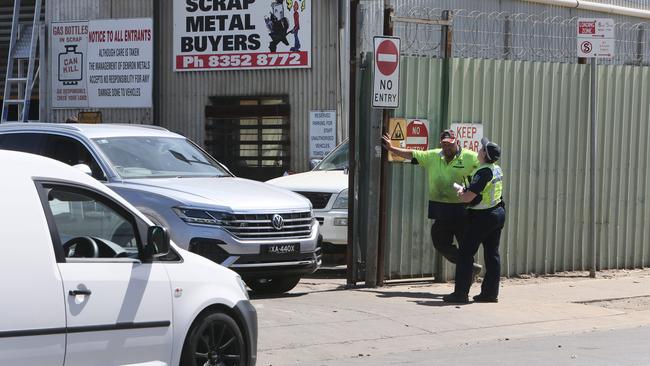 Police interview employees at the scrap metal yard in 2021. Picture: Emma Brasier