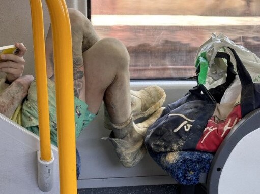 A tradie has sparked outrage for what he did on a Sydney train. Picture: Reddit.