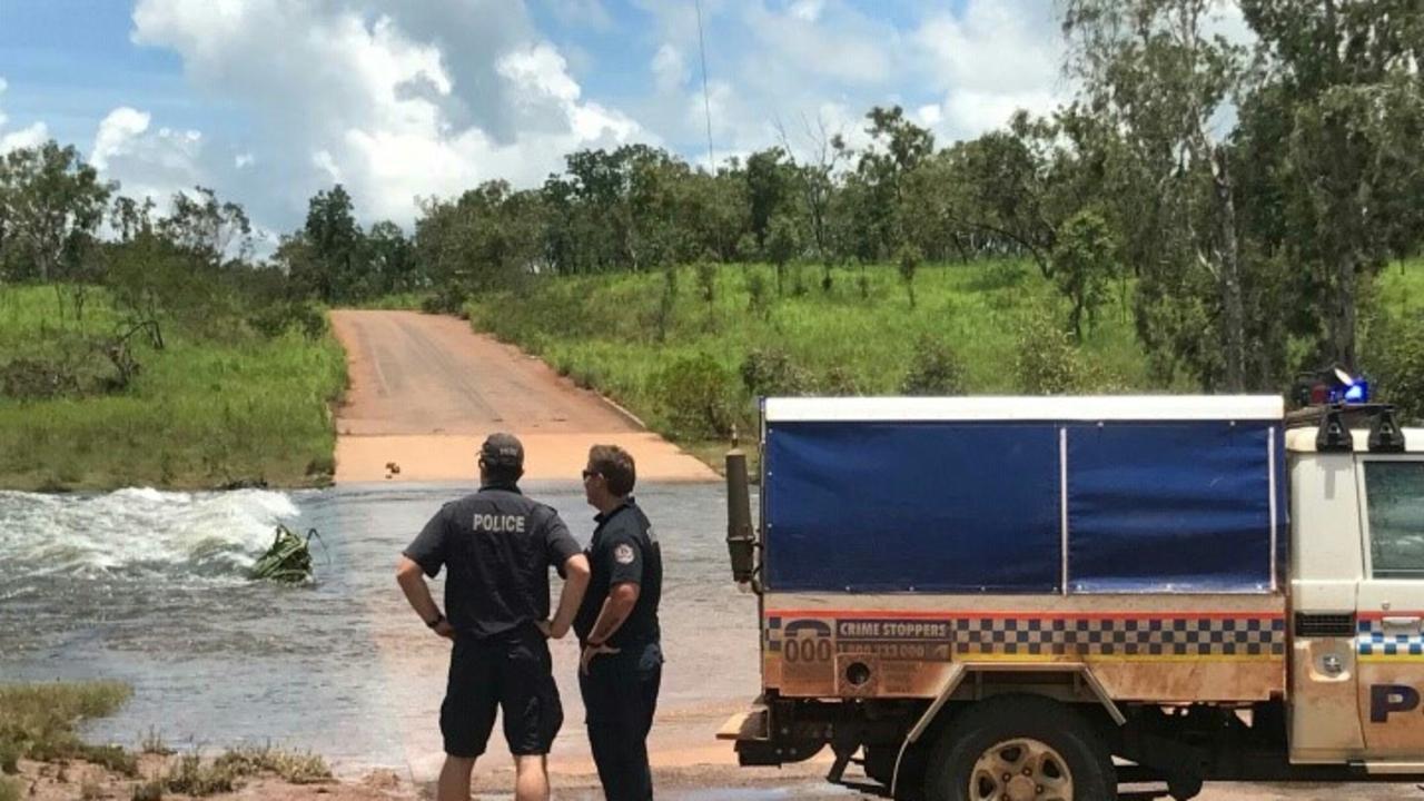 Police at a river crossing between Peppimenarti and Palumpa. Picture: NT Police