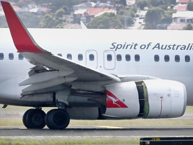 SYDNEY, AUSTRALIA - NewsWire Photos JANUARY 18, 2023: Qantas plane on the tarmac at Sydney International Airport following an emergency mayday alert issued by flight QF144 from Auckland to Sydney. Picture: NCA NewsWire / Jeremy Piper