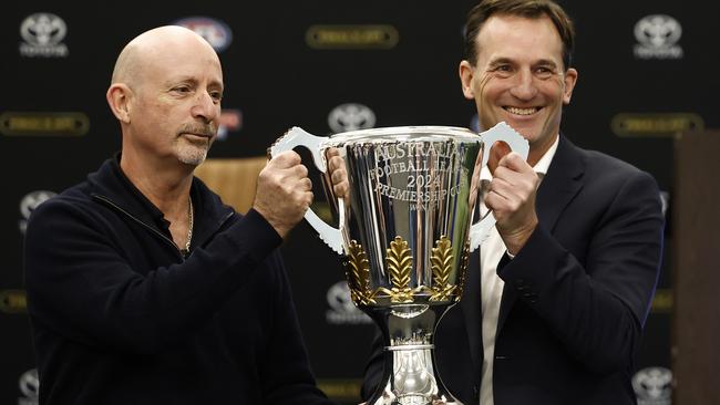 Vin Formosa of Cash's (left) and AFL CEO Andrew Dillon (right) with the 2024 Cup. (Photo by Michael Willson/AFL Photos via Getty Images)